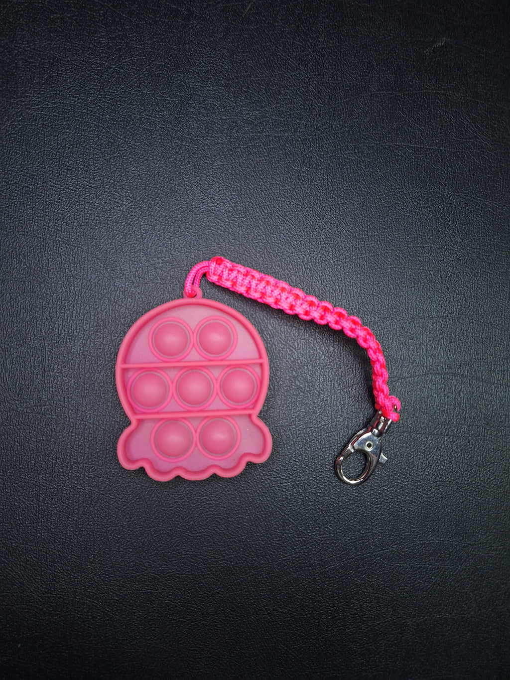 Neon pink pop it micro cord Keychain
