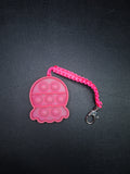 Neon pink pop it micro cord Keychain