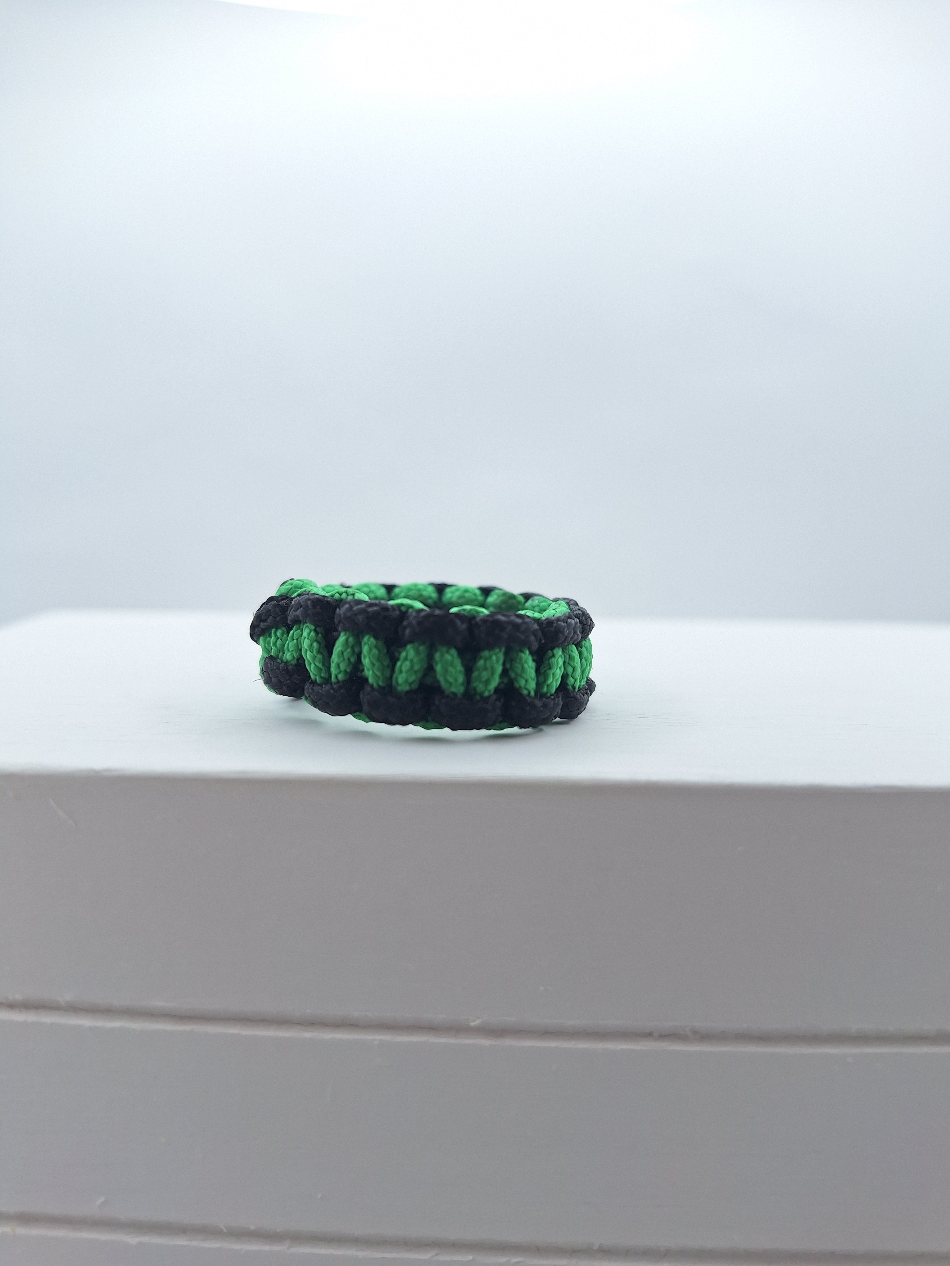 Green/black micro cord ring