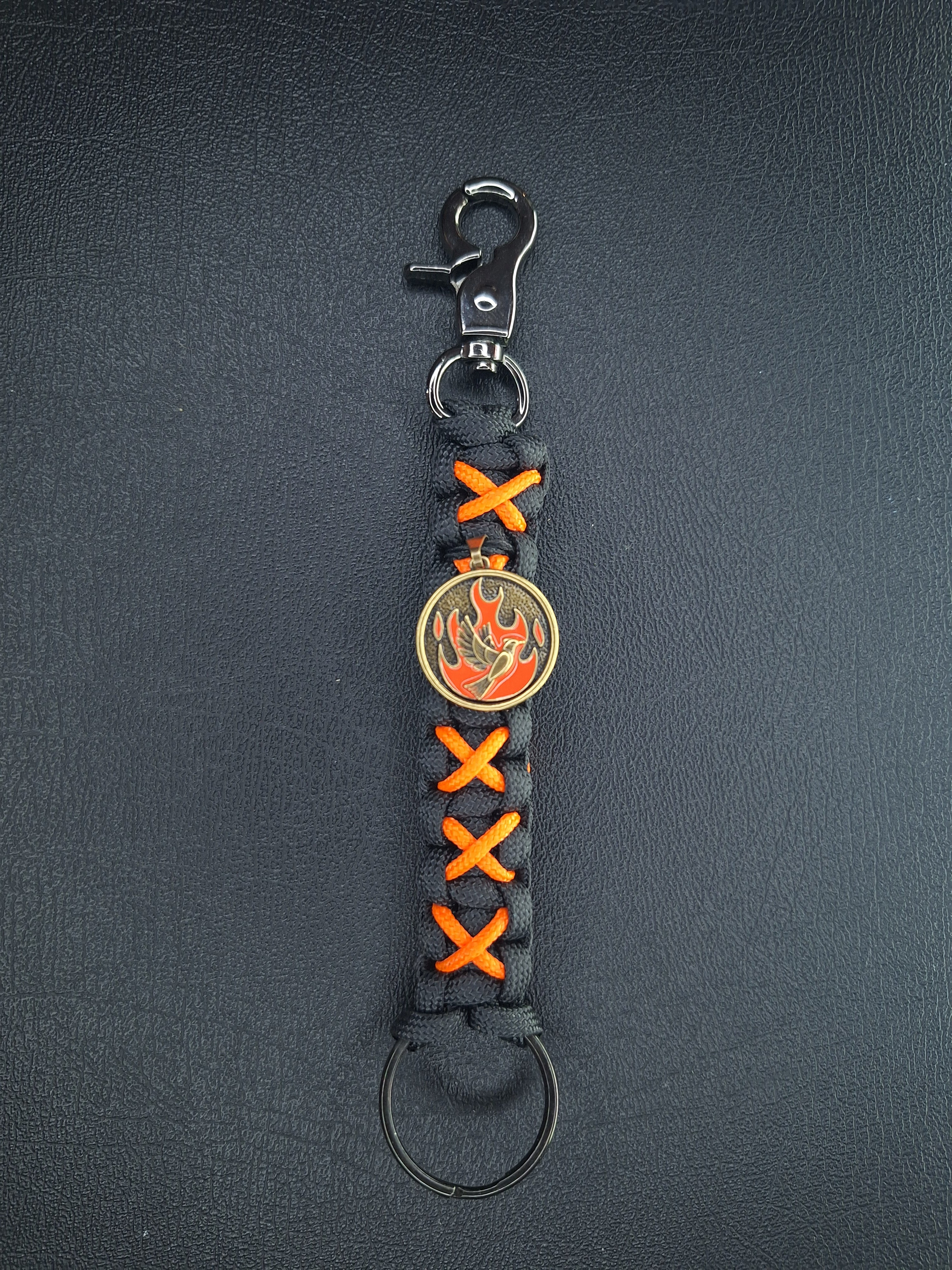 Black/orange paracord Keychain with dove with flames
