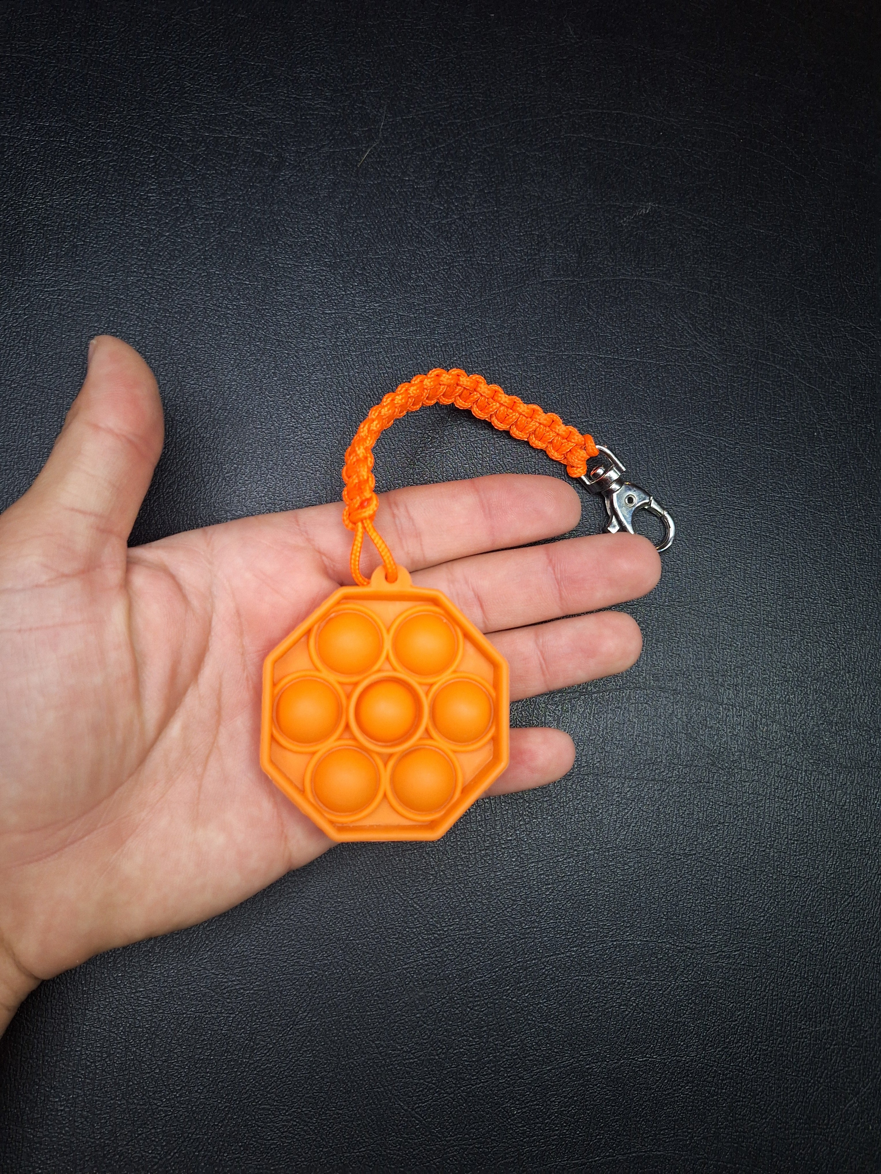 Orange pop it micro cord Keychain