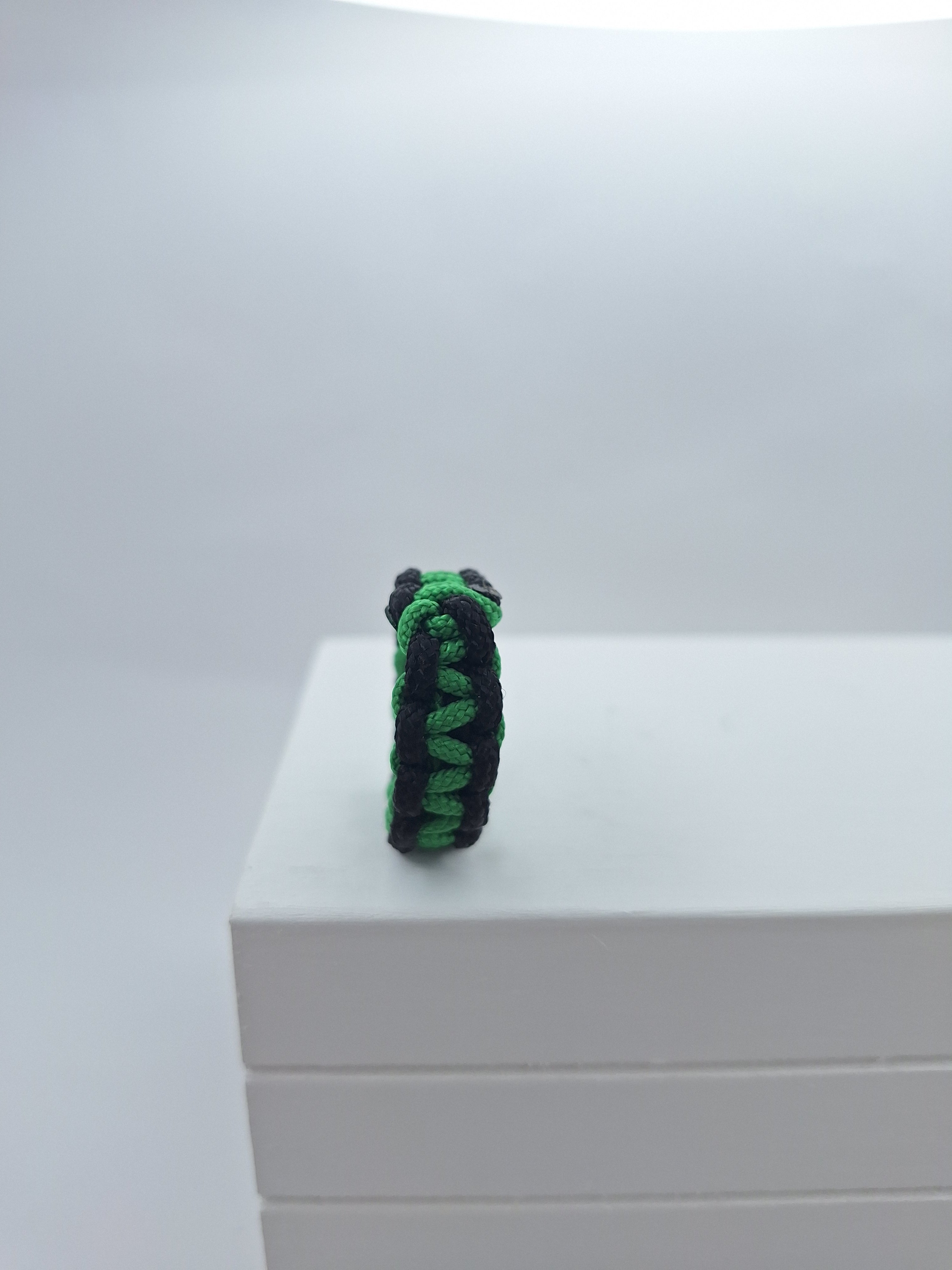 Green/black micro cord ring