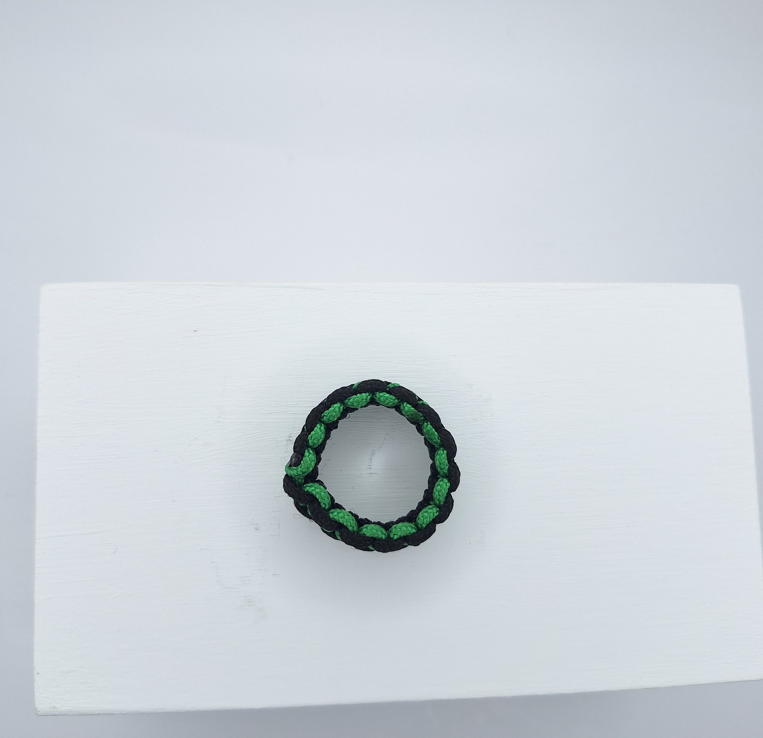 Green/black micro cord ring