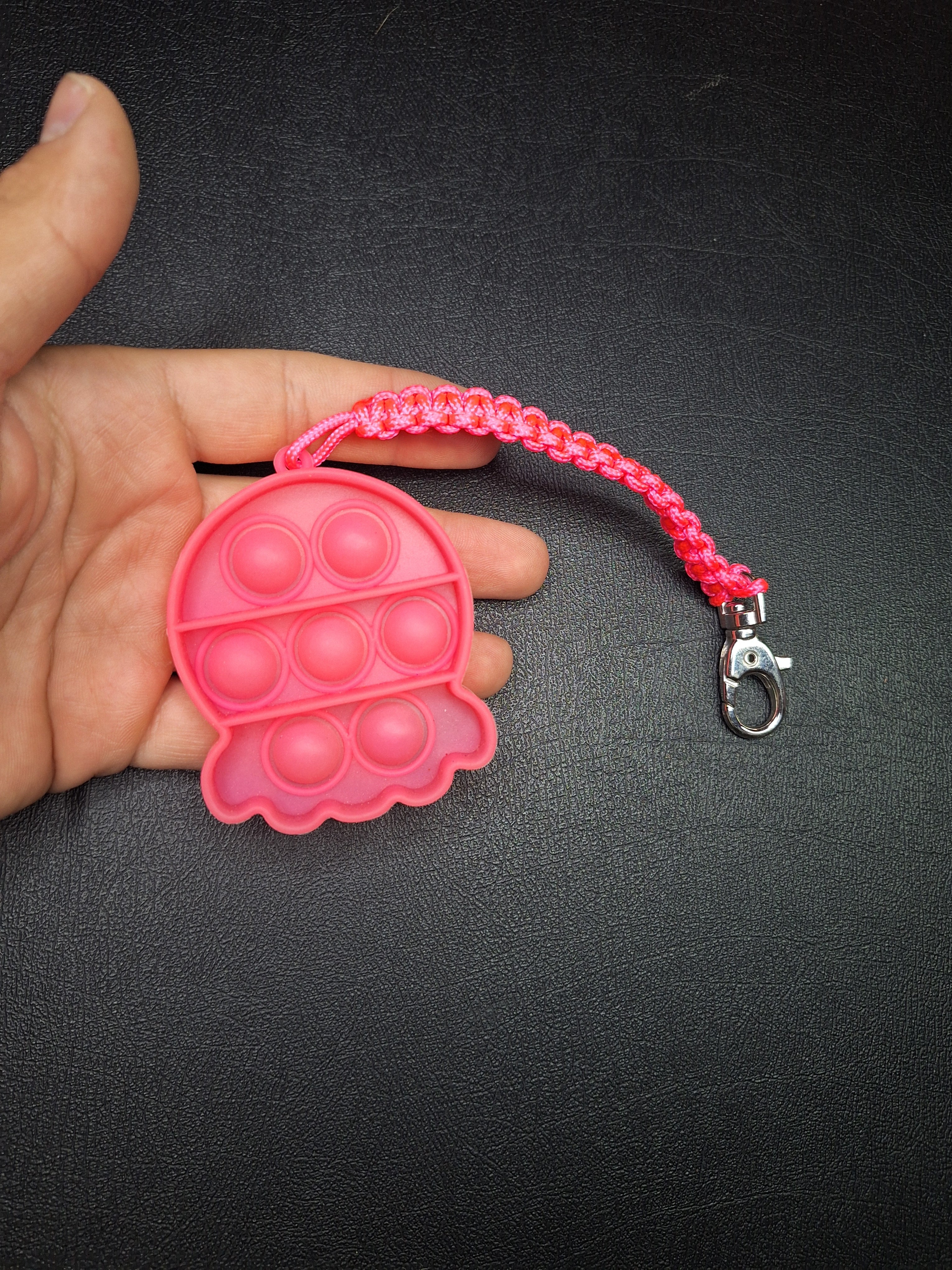 Neon pink pop it micro cord Keychain