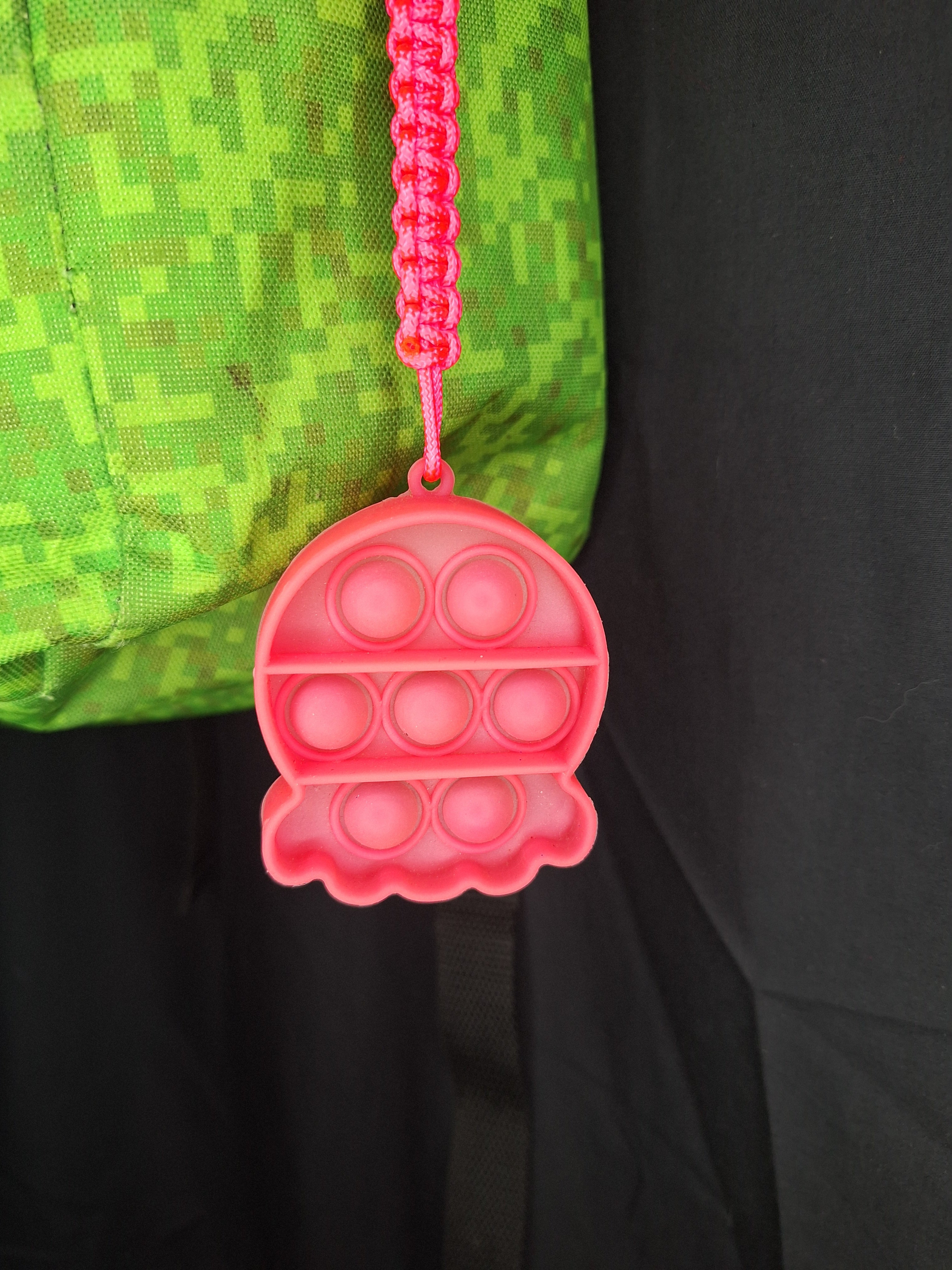 Neon pink pop it micro cord Keychain
