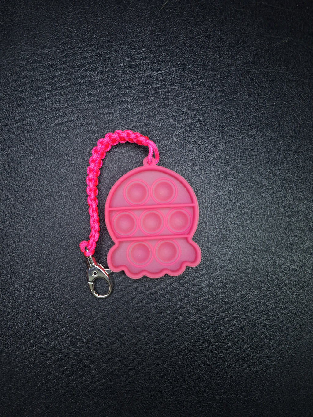 Neon pink pop it micro cord Keychain