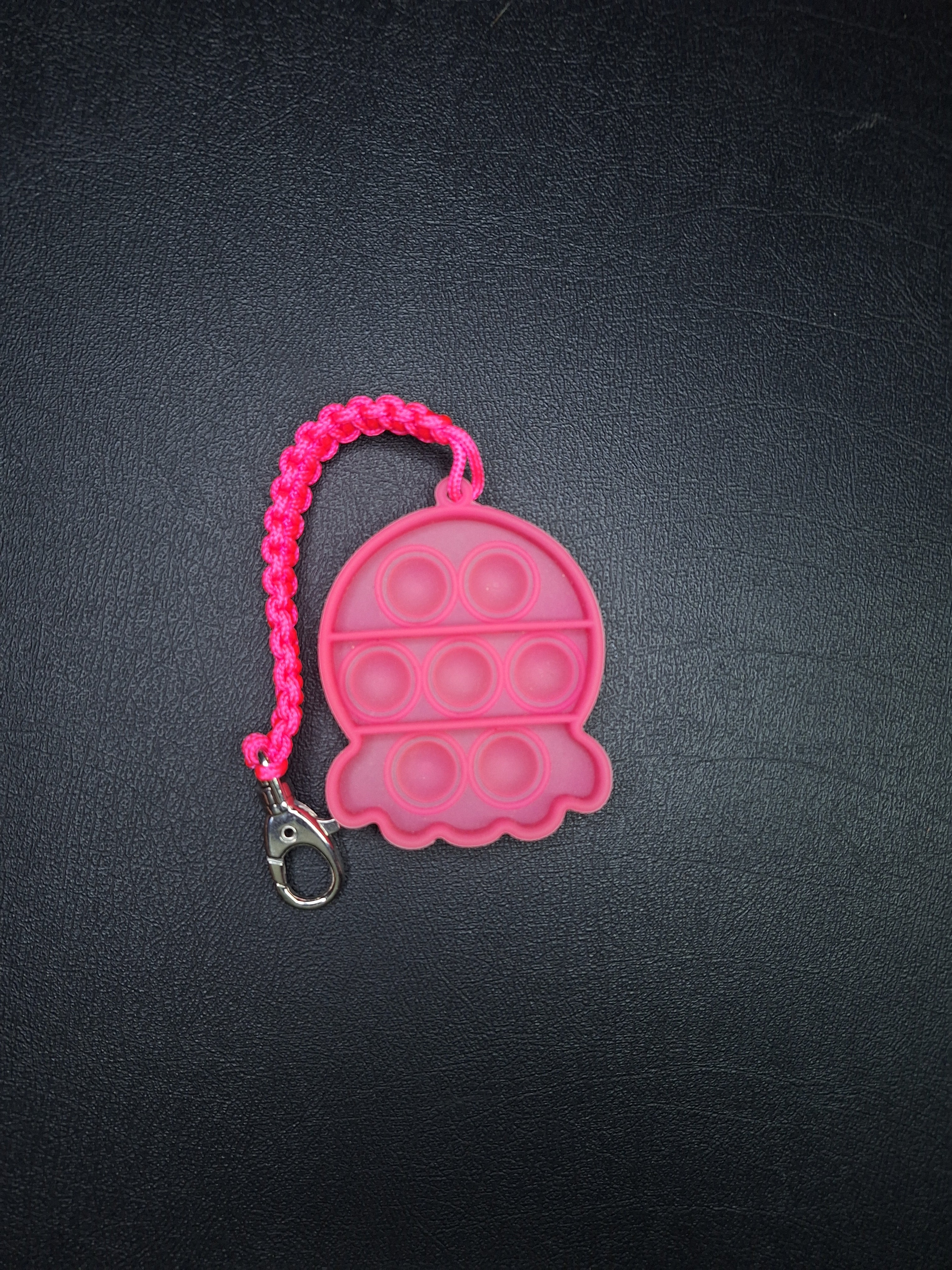 Neon pink pop it micro cord Keychain