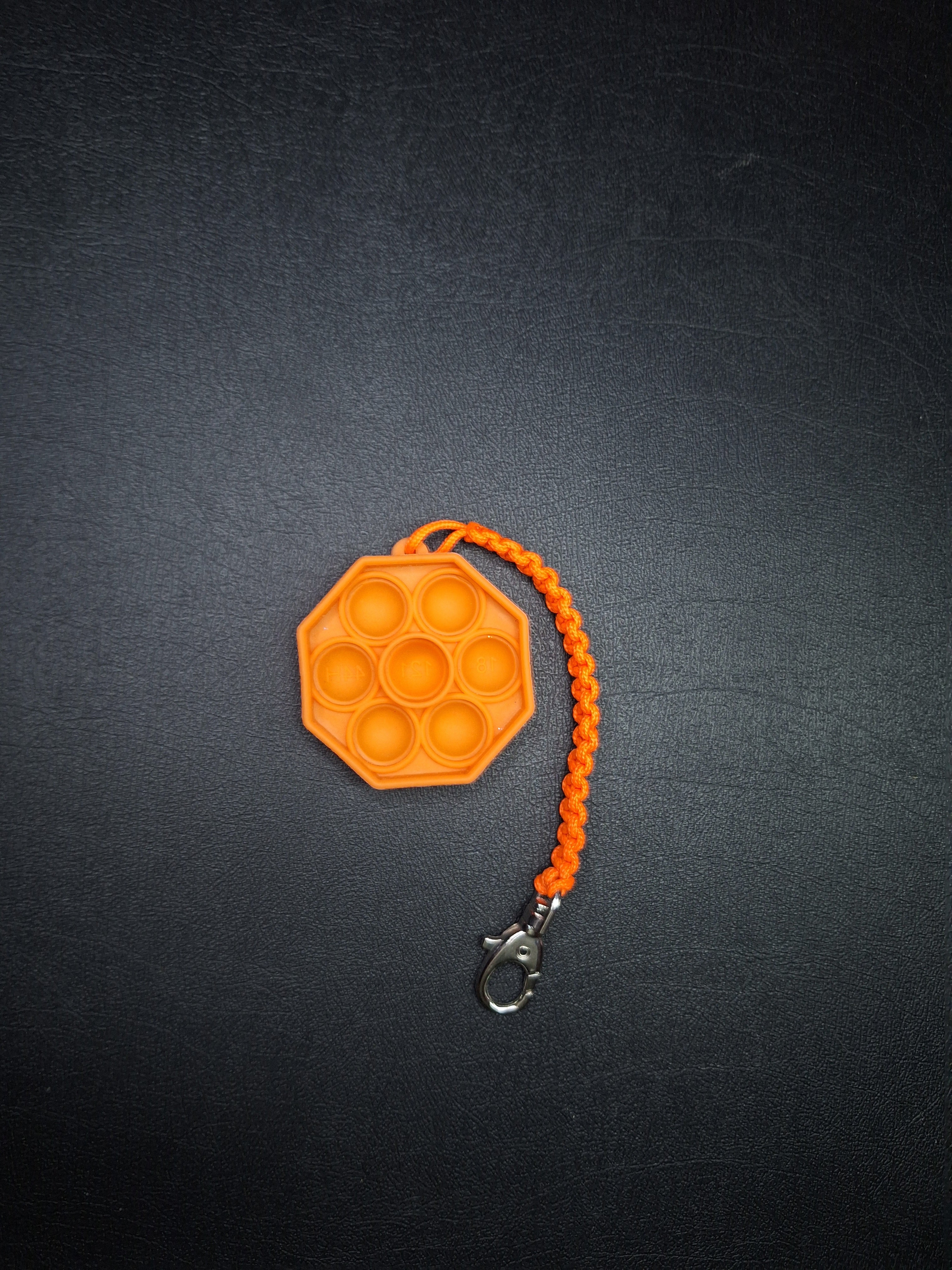 Orange pop it micro cord Keychain