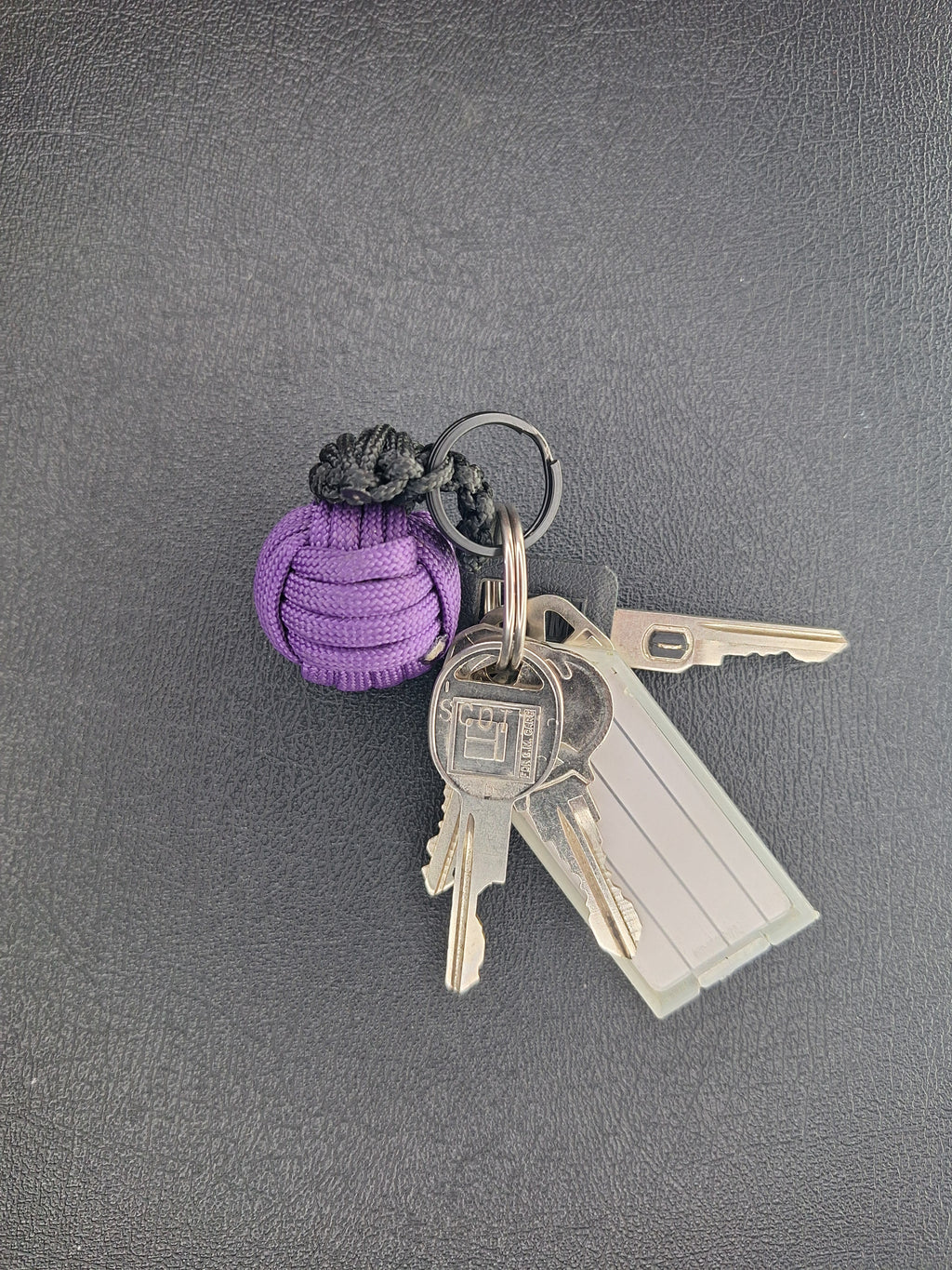 purple paracord monkey fist grenade keychain