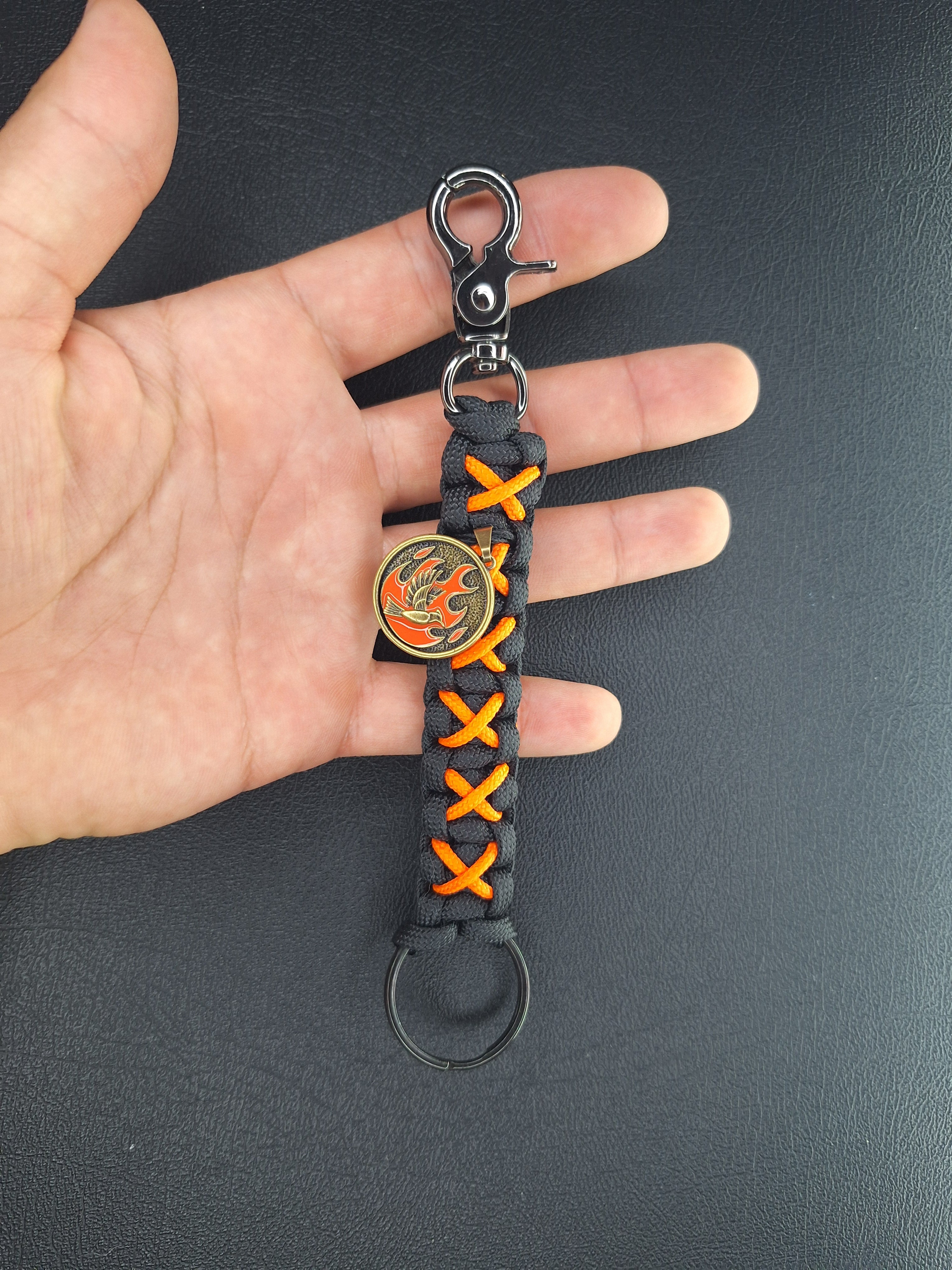 Black/orange paracord Keychain with dove with flames