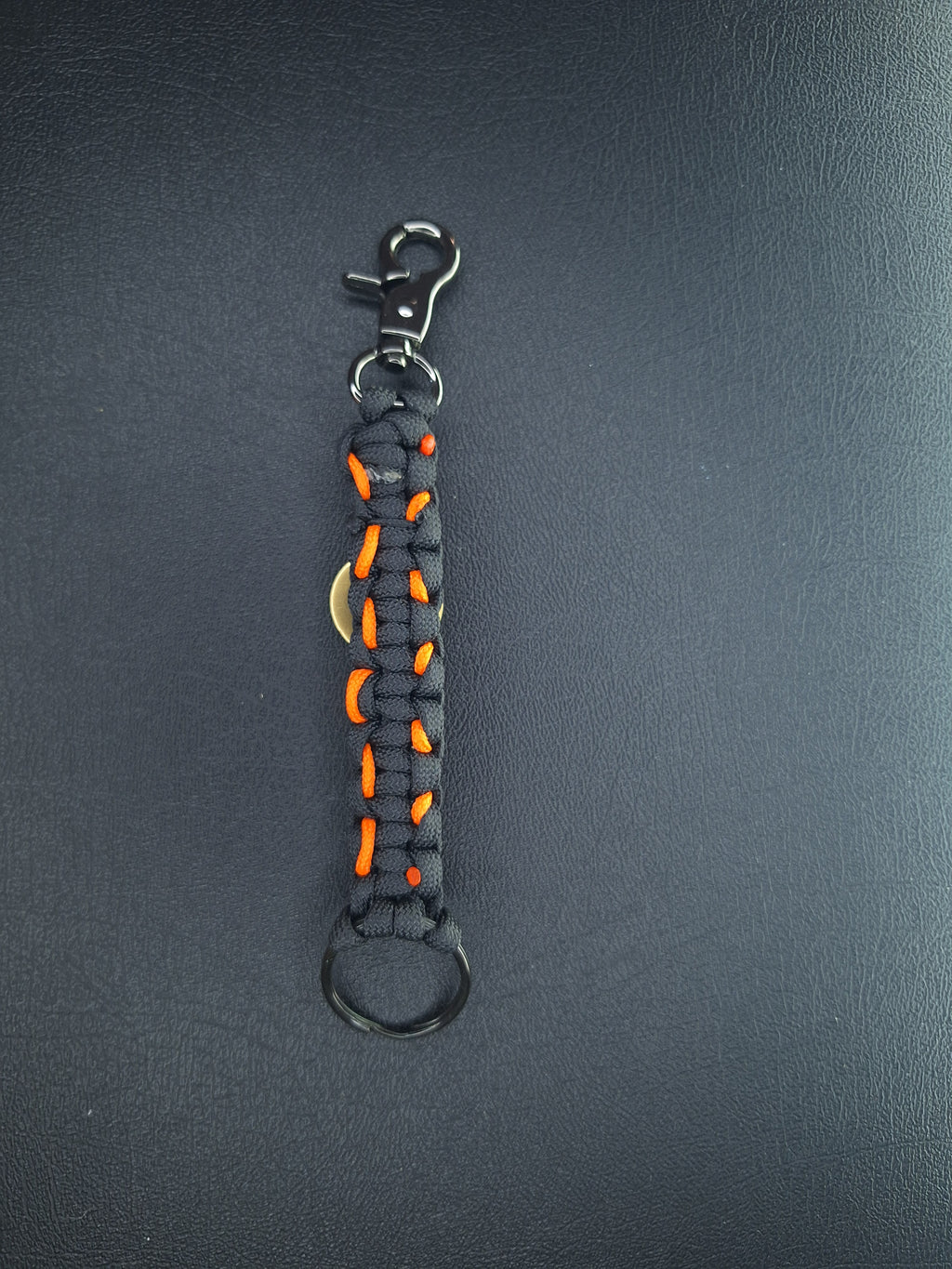 Black/orange paracord Keychain with dove with flames