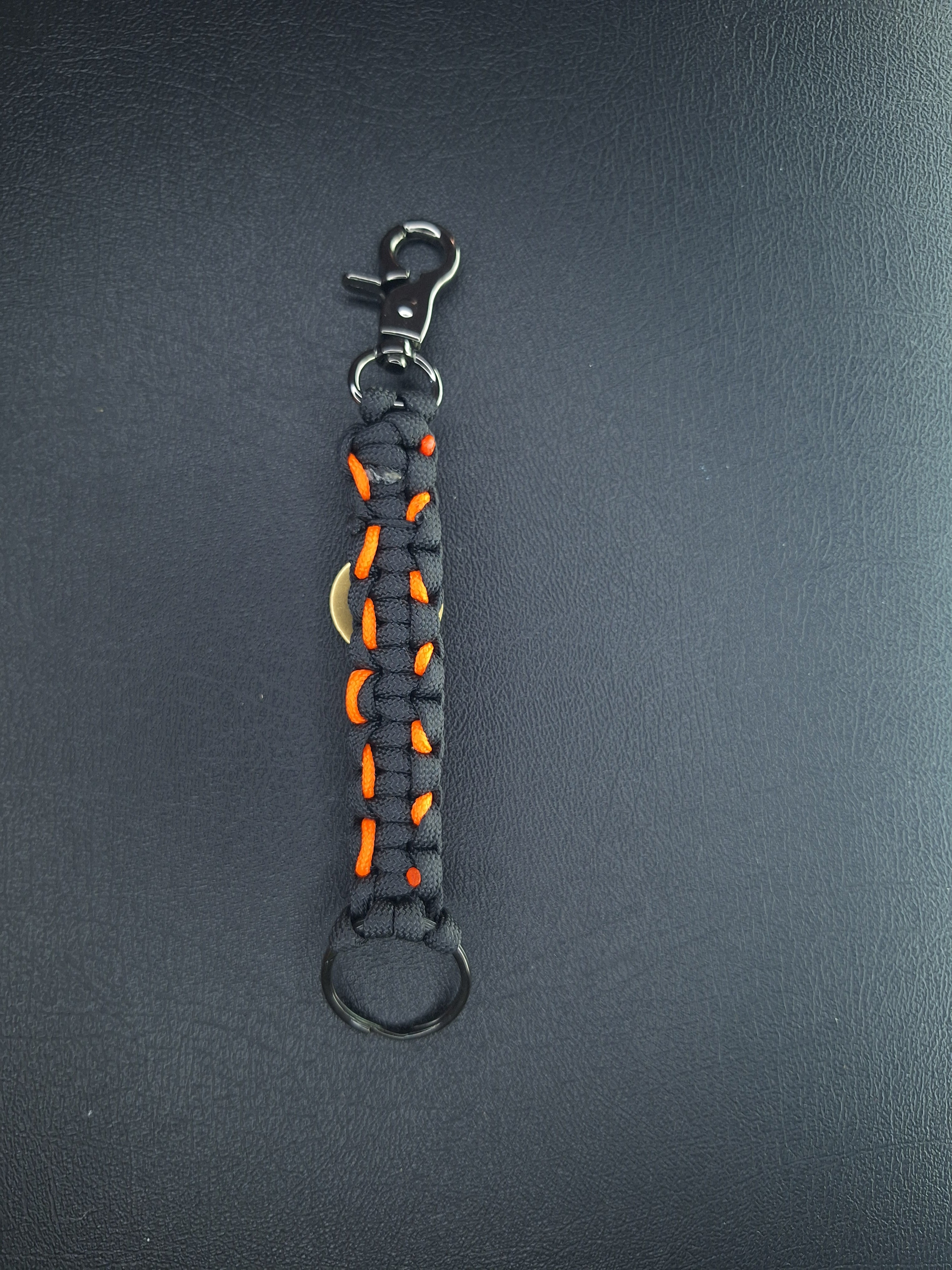 Black/orange paracord Keychain with dove with flames